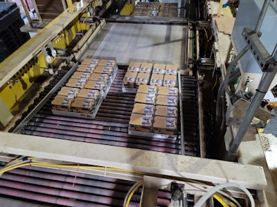 End-of-line packaging consists of a conventional palletizer with its own turner/divider.