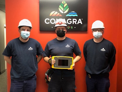 Conagra Brands’ Menomonie, Wis., team displays the ultrasonic imager that helps it identify air leaks.