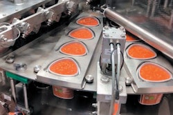 Triangular containers are filled on Dosomat equipment, also from WALDNER.