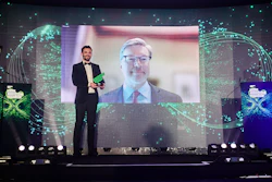 Stewart Leeth, chief sustainability officer for Smithfield Foods, accepts the “Profit with a Purpose” World Sustainability Award on behalf of the company.