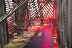 Fresh tacos that were once too hot to handle manually are now placed into trays by JLS Talon robots.