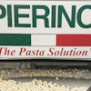 Pierino gnocchi exit the Messer Wave Impingement Freezer. The wave-like action helps keep the product separated while the impingement gas flows increase throughput, cryogen efficiency, and operating leverage for the premium pasta maker.