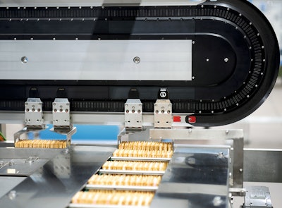 Cavanna’s first XTS application is a 90-deg transfer system for packaging slugs of cookies. (© Cavanna