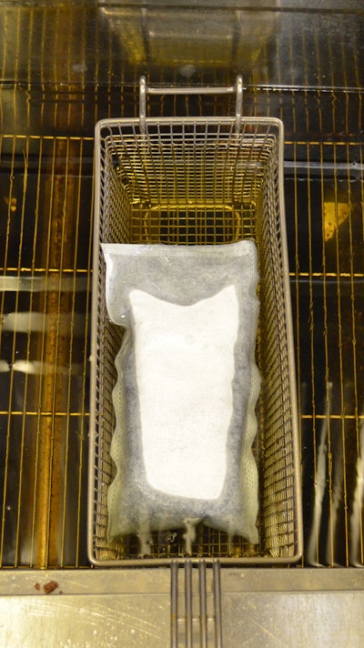Placed in a deep fryer at the end of each day, pods absorb impurities in cooking oil and extend its life by 25% or more. Photo courtesy of FreshFry.