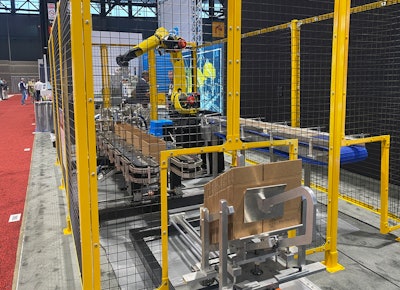 Yeaman Machine's new top-load case packer with robotic infeed and case erecting.
