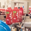 At the loading and tilting station, bottled juices are loaded automatically into vessels.