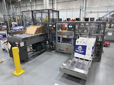 Box shop operations include erecting a heavy, double-walled printed corrugated case, automatic taping, and robotic partition inserting.