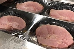 Once cut from the center of hams, steaks are placed in individual pockets. By installing cameras on the line, Smithfield Packaged Meats has been able to reduce its plastic/film waste by about 75%.