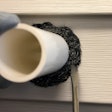 Xcluder's polyester blend fill fabric can expand into tight entryways.