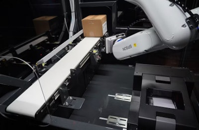 Custom self-contained labeling cell with an Epson VT6L All-in-One 6-Axis Robot.