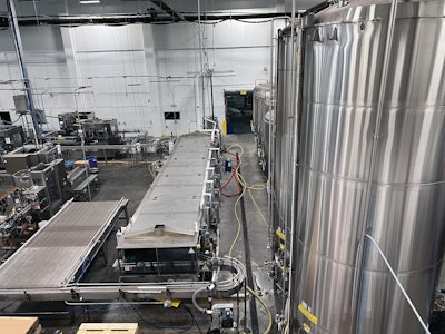 A single pasteurization tunnel with a 42-min dwell accommodates both cans and bottles at the same time.