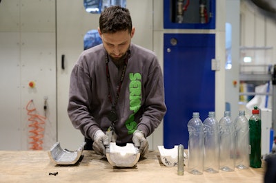 The mold 3D printed with Rigid 10K Resin is manually polished and then assembled into a metal frame.