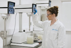 Modern tabletop processing equipment gives R&D teams unprecedented control over formulations before scaling up. Here, a food technician creates a small batch of guar gum.