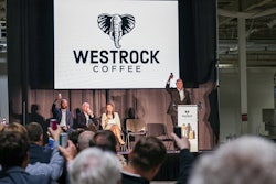 Scott Ford, co-founder and CEO of Westrock Coffee, raises an RTD can to officially toast the grand opening of the company’s RTD facility in Conway, Ark. He is pictured with (from left) Will Ford, group president of operations; Joe T. Ford, co-founder and chairman; and Arkansas Governor Sarah Huckabee Sanders.