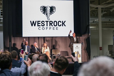 Scott Ford, co-founder and CEO of Westrock Coffee, raises an RTD can to officially toast the grand opening of the company’s RTD facility in Conway, Ark. He is pictured with (from left) Will Ford, group president of operations; Joe T. Ford, co-founder and chairman; and Arkansas Governor Sarah Huckabee Sanders.