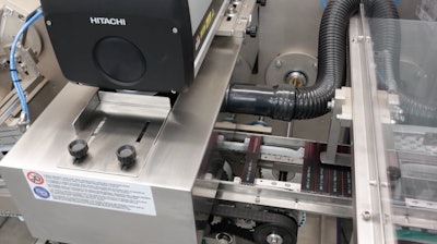 Carton coding with a laser coder.