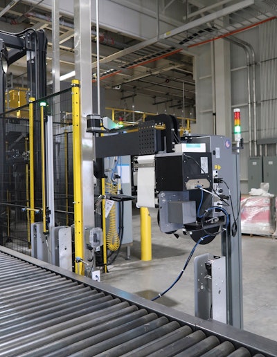 Stretch wrapped pallets get a print-and-apply label applied by this unit.