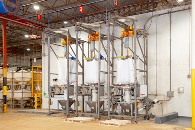 Here are three of the five bulk weighing and batching systems at Sazón’s Miami-area plant, each comprised of a bulk bag discharger on load cells, that move seasoning from bulk bags through a pneumatic conveying line to five blenders.