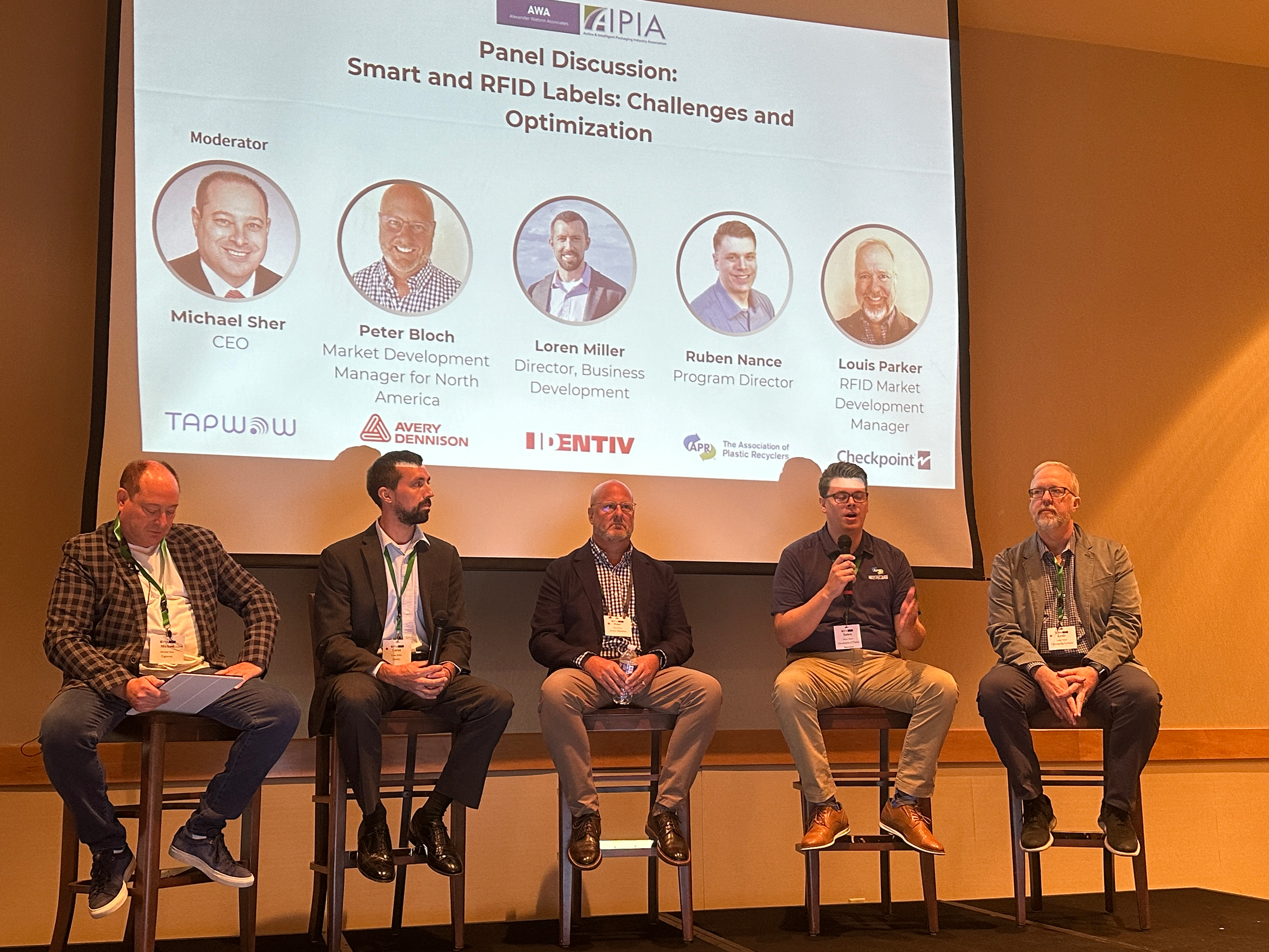 (from left) Michael Sher, CEO, Tapwow; Loren Miller, Director, Business Development, Identiv; Peter Bloch, Market Development Manager for North America, Avery Dennison; Ruben Nance, program director, preferred design recognition, Association of Plastics Recyclers (APR); Louis Parker, Business Development Manager, Checkpoint Systems