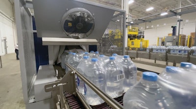 Clear film is pictured, but Cristalia recently employed decorated, registered film for a better appearance when the bottles are stacked as stand-alone displays