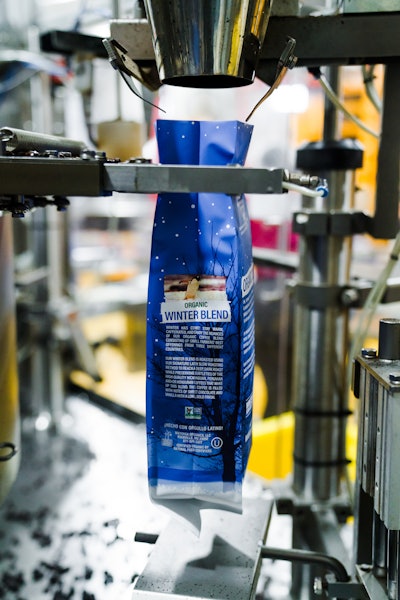 Shown here is a single bag as it arrives in the station where the auger filler drops product in.