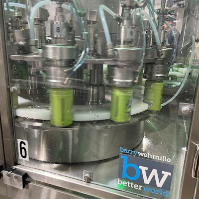 Twelve-head rotary filling is immediately followed by a three-head seamer for low oxygen pickup.