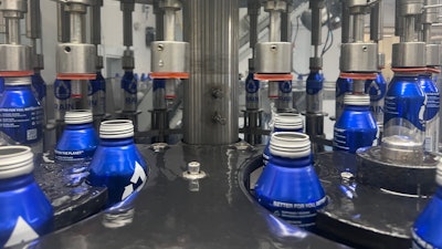 Filling on a 24-head rotary filler.