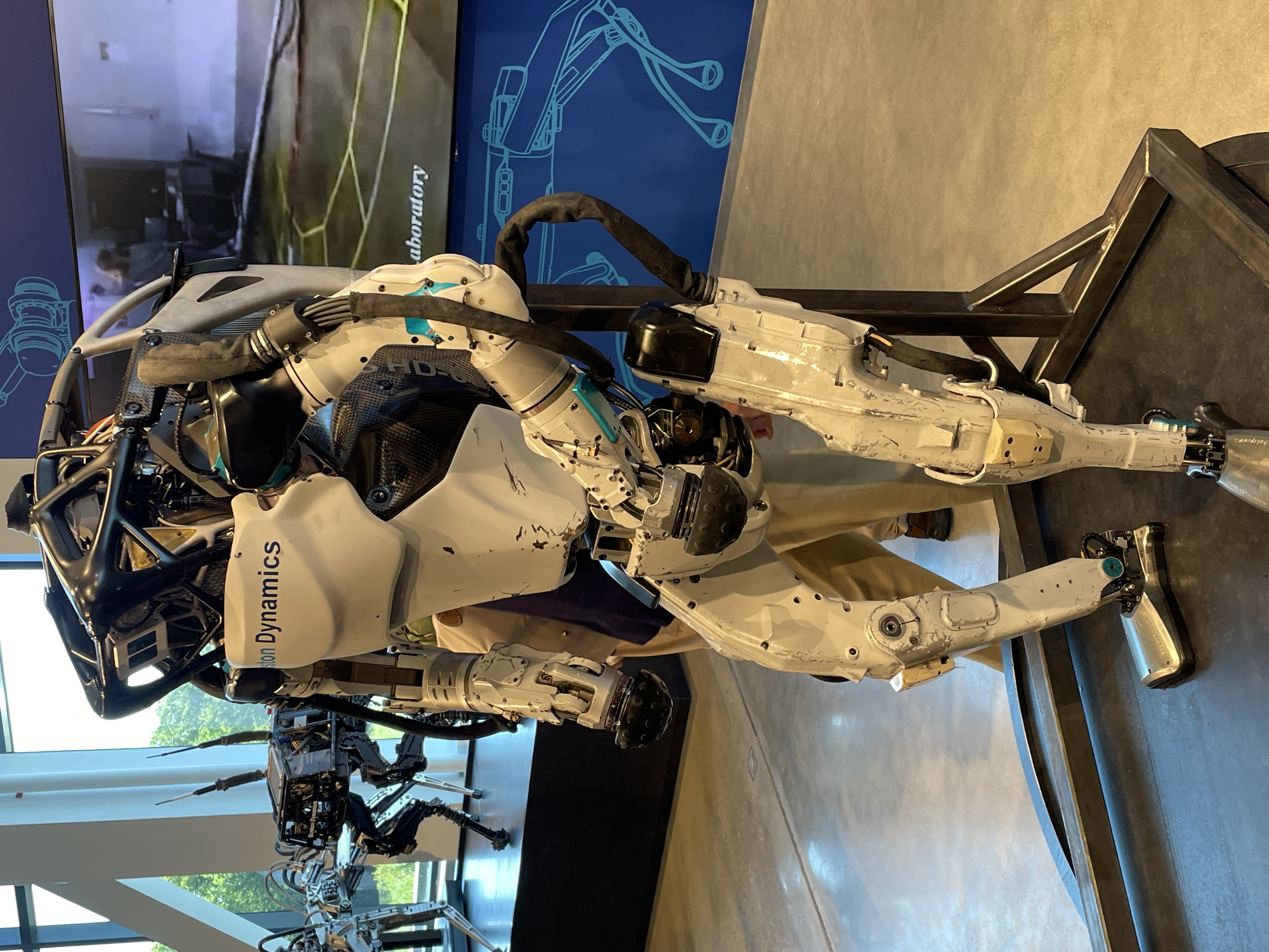 This is an early version of Boston Dynamics' Atlas robot that uses hydraulics (and continues to leak fluid). While we saw the updated version that is all electric and only for research, we were not allowed to photograph it.