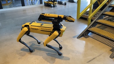 This is Spot with the extendable arm and gripper prior to demonstrating how easily it can move up a flight of stairs.