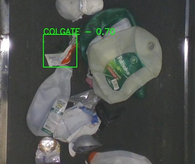 Glacier’s AI system identifies a Colgate toothpaste tube on a Material Recovery Facility (MRF) conveyor line. The system uses optical and material recognition to distinguish HDPE tubes from other plastics, verifying how often they are captured in the recycling stream.