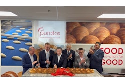 U.S. Congressman Donald Norcross (D-N.J.) cuts giant glazed challah bread to celebrate the opening of Puratos' new UHT bakery glaze facility.