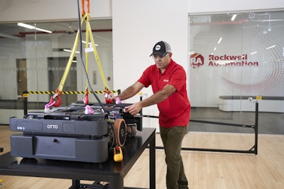 A worker at Rockwell Automation headquarters in Milwaukee assembling the OTTO 600.