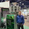 High Tek vertical packaging machine at industrial trade show with equipment display