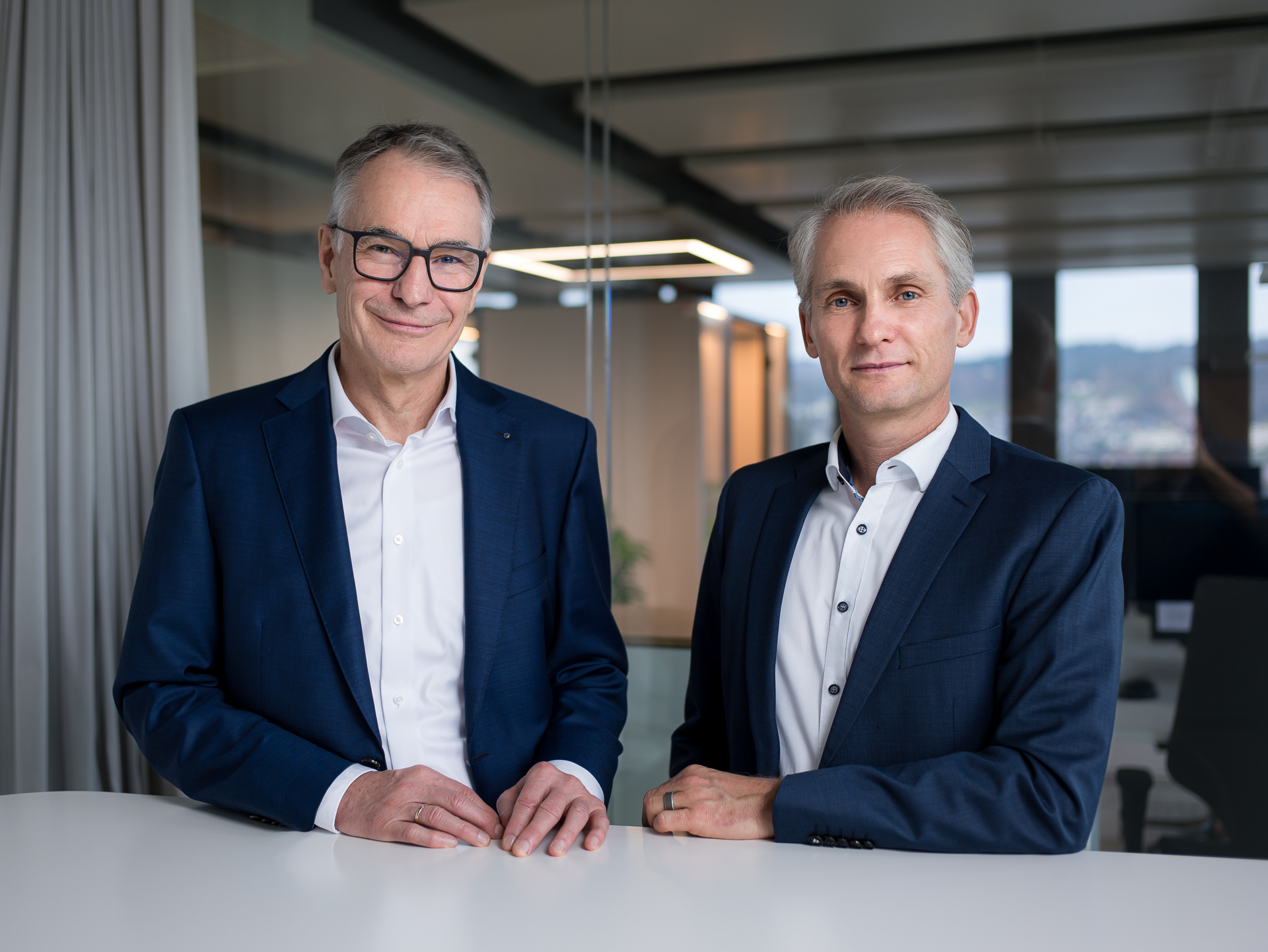 Former CEO and future Chair of the Board of Directors Martin Becker (left) and new CEO Alexander Heizler.