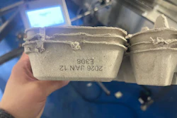 The side of each carton gets a clean, readable lot and date code.