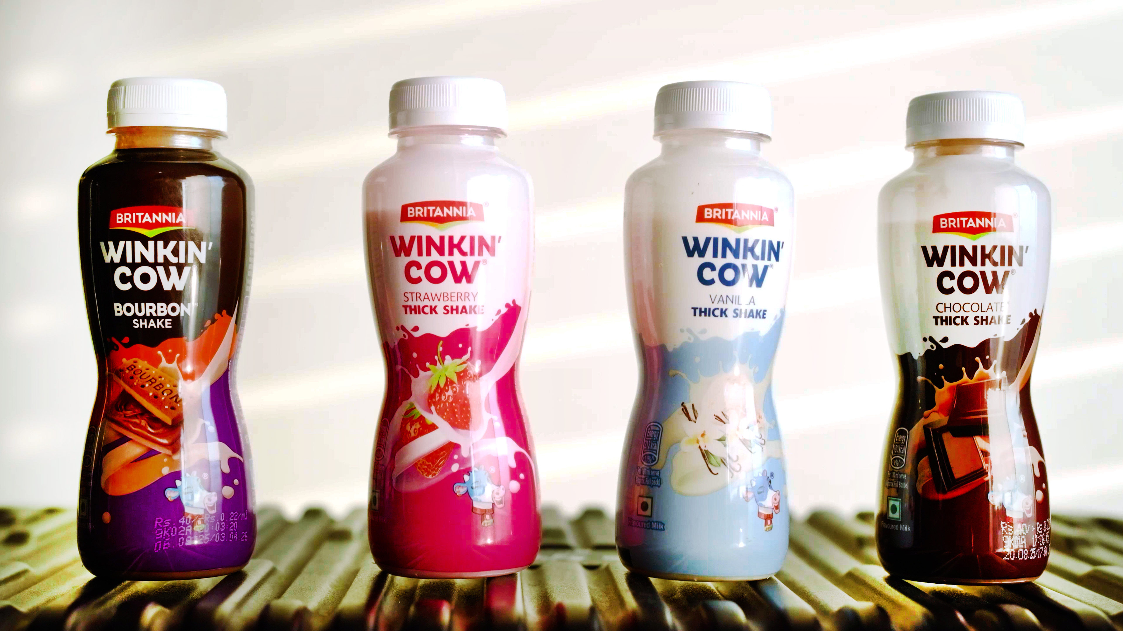 Britannia&rsquo;s Winkin&rsquo; Cow portfolio spans multiple SKUs and flavors, with transparent PET bottles reinforcing product visibility and on-the-go consumption.