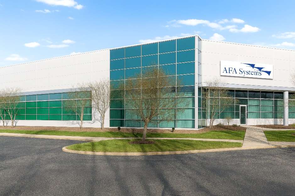 AFA Systems modern corporate office building with teal glass facade and white exterior