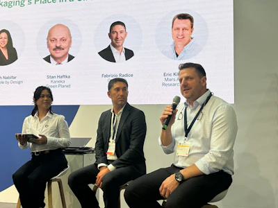 Eric Klingenberg (speaking), materials science lead at Mars Advanced Research Institute, discusses where compostable packaging fits within circular packaging systems during a panel discussion at interpack 2026. Corapack's Fabrizio Radice (center) and moderator Maria Monique Murillo are to the left.