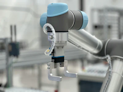 Blue and gray gimbal camera stabilizer mounted on robotic arm in industrial setting