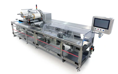 Industrial packaging machine with control panel and mechanical components for automated labeling and product handling