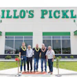 From left, Dustin Etchison (Grillo's Pickles Indiana General Manager), John Linehan (IFG President & Board Director), Bill Russell (Grillo's Pickles Chief Operating Officer), Adam Kaufman (Grillo's Pickles President & CEO) and Mark Taira (King's Hawaiian CEO) celebrate the grand opening of the new Grillo's Pickles production facility in Bartholomew County, Ind.
