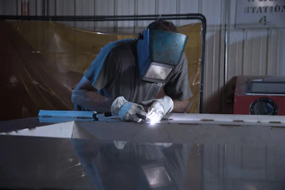 A ProFab technician performs onsite welding, one of the services the company provides as part of its installation management.