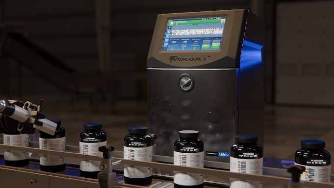 VideoJet industrial printer with ink bottles arranged on conveyor system