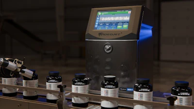 VideoJet industrial printer with ink bottles arranged on conveyor system