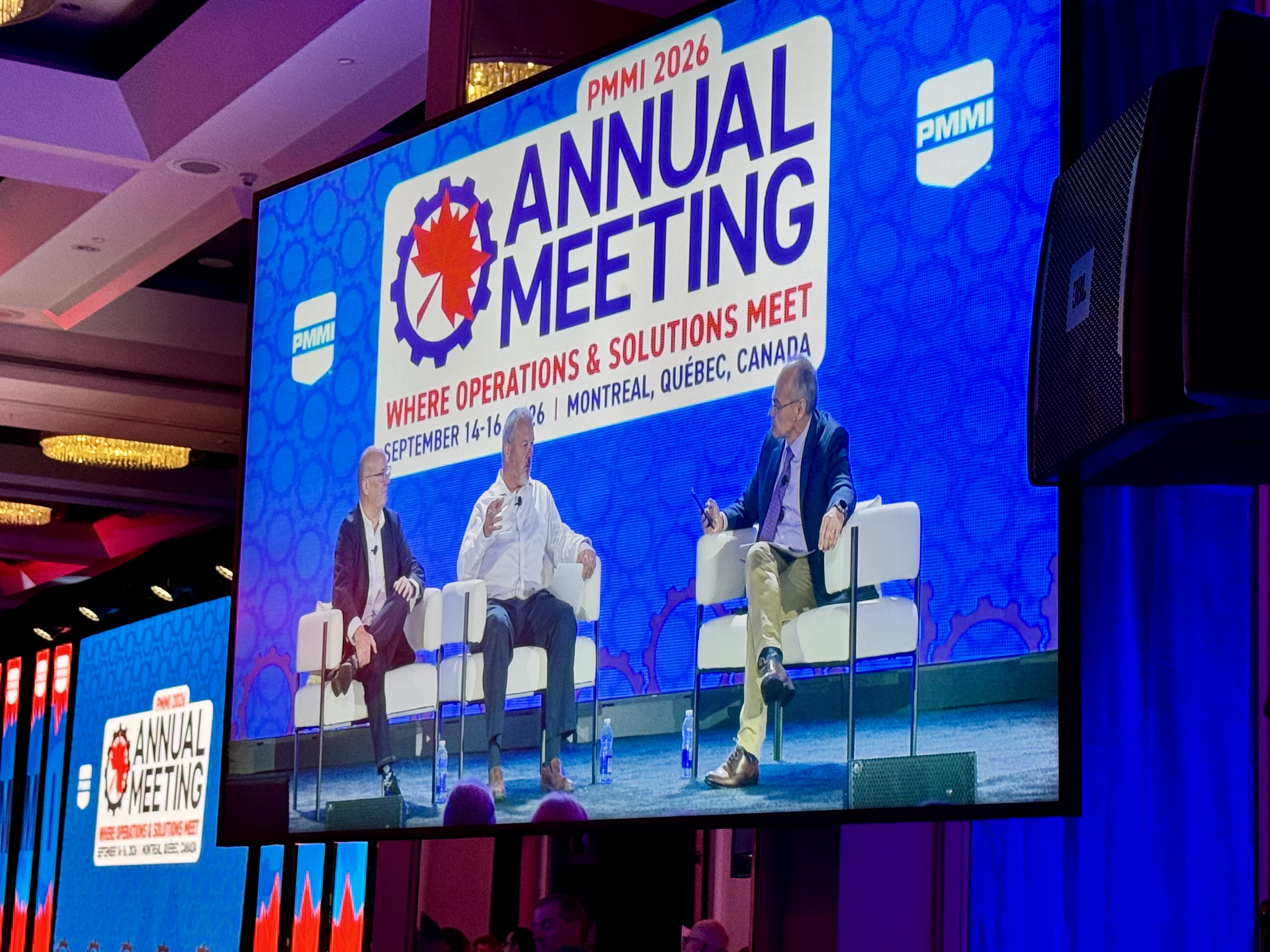PMMI 2026 Annual Meeting panel discussion with three speakers on stage in Montreal, Quebec