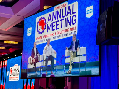 PMMI 2026 Annual Meeting panel discussion with three speakers on stage in Montreal, Quebec