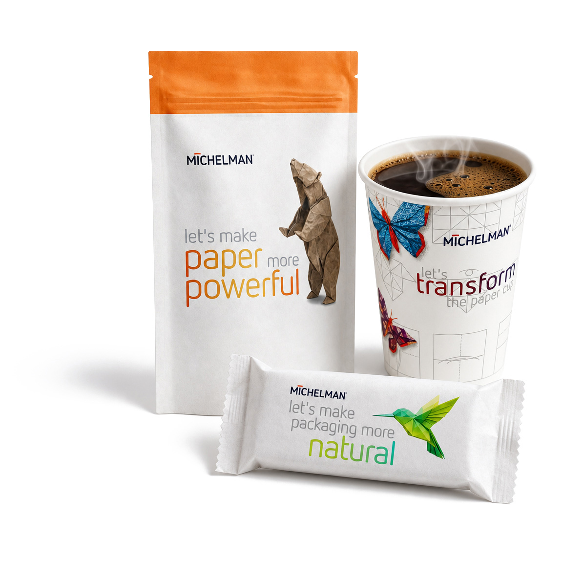 Michelman branded packaging collection featuring white pouch, coffee cup, and natural product sachet with orange, blue, and green accents