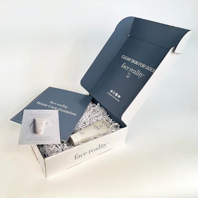 New professional partners receive a fully branded mailer printed inside and out — an intentional exception to a shipping program otherwise built around unbranded boxes and branded tape.