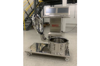 READCO industrial mixing machine with stainless steel drum and control panel in warehouse facility