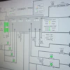 Industrial process flow diagram showing cooker system with valves, sensors, and product outputs including fermentation and condensation stages